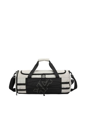 Borsone con una combinazione di colori bianco e nero, tessuto strutturato, due manici, una tracolla staccabile e una tasca davanti con zip.