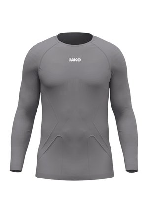 Maglia sportiva grigia a maniche lunghe con design senza cuciture e logo "JAKO" centrato vicino al collo su sfondo bianco semplice.