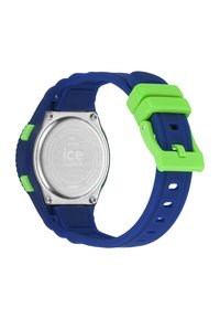 Orologio in silicone blu con chiusura verde. Presenta un retro in acciaio inossidabile, è resistente all'acqua fino a 100 metri e ha un design a faccia rotonda.