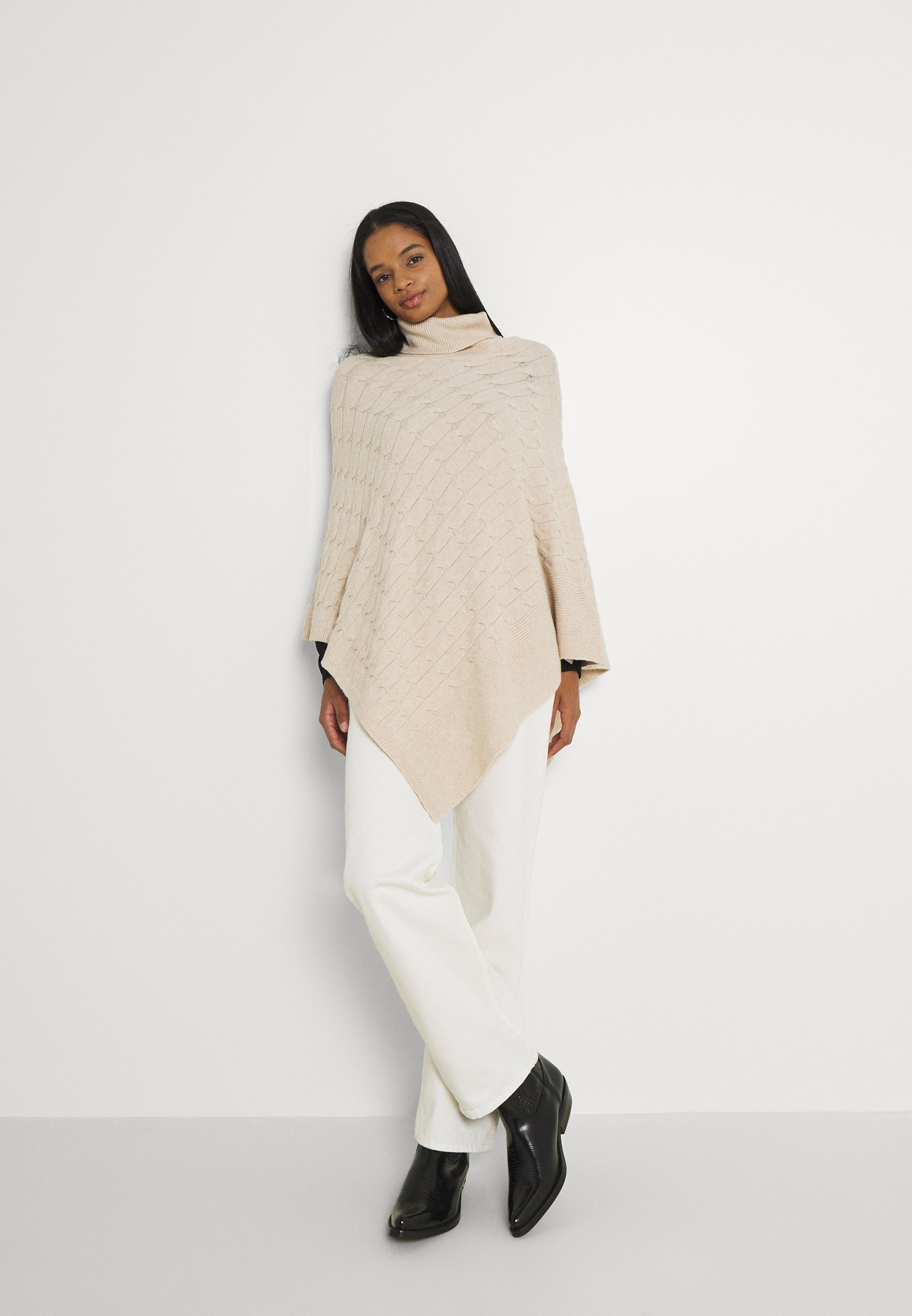 Women RUBY CABLE KNIT PONCHO - Cape Women RUBY CABLE KNIT PONCHO - Cape