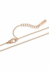 Rose gold kædedyse med en hummerklap, lille leddesign, og et graveret skilt med "iette" vedhæftet den justerbare kæde.
