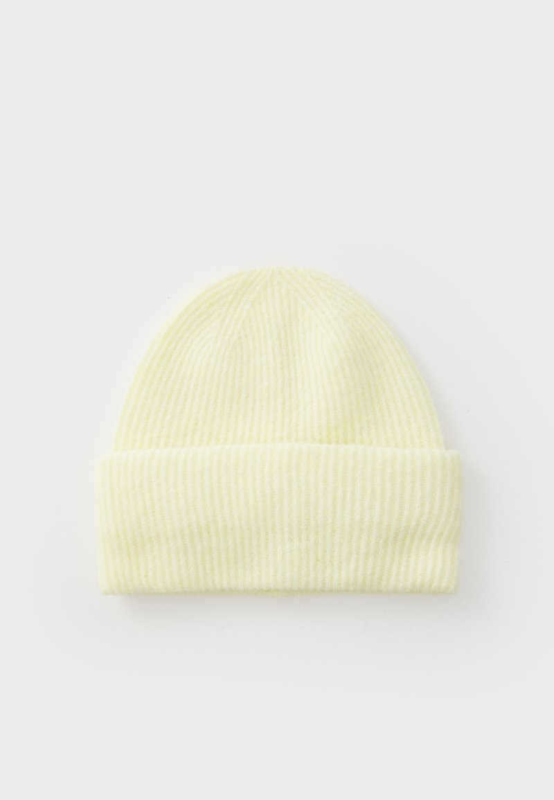 Yellow ribbed knit beanie hat with a cuff. Made from soft, textured fabric, it features vertical stripes and a snug fit.