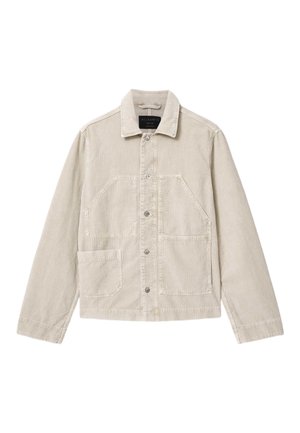 Beige corduroy jacket with button front, two large angled chest pockets, a smaller pocket on lower left, and a classic collar.