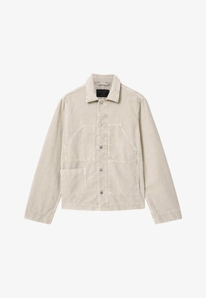 Beige corduroy jacket with button front, two large angled chest pockets, a smaller pocket on lower left, and a classic collar.