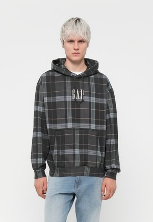 Black plaid hoodie with gray and red lines, featuring a kangaroo pocket and a drawstring hood. "GAP" logo in white across the chest.