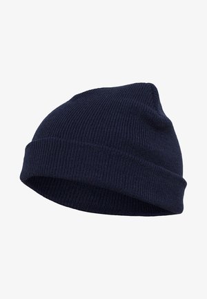Tengerészkék kötött sapka, puha tapintással, hajtott mandzsettával és fokozatosan elvékonyodó tetejével, melegítésre és hétköznapi viseletre alkalmas.