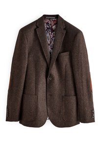Blazer in tweed marrone con accenti sulle ginocchia, chiusura a due bottoni e una fodera interna decorata con disegni floreali.