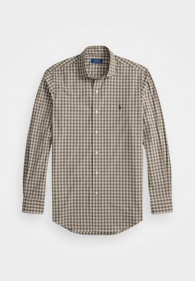 Καφέ και λευκό καρό πουκάμισο με μακριά μανίκια και γιακά που κουμπώνει. Περιλαμβάνει λογότυπο στο αριστερό στήθος και καμπυλωτό στρίφωμα.