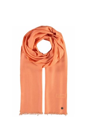 Écharpe couleur corail-orange en tissu doux, avec des extrémités frangées et un design en boucle. Comprend un petit logo près de la base.