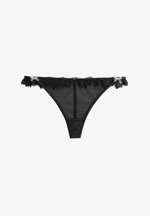 Zwarte kanten string met een transparante mesh body, decoratieve kantafwerking bij de tailleband en twee kleine strikjes aan de zijkanten.