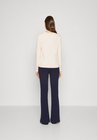 Tommy Hilfiger Pulover - whimsy pink