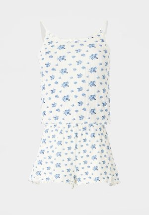 Λευκό ολόσωμο χωρίς μανίκια με λεπτές τιράντες, διακοσμημένο με μπλε λουλουδένιο σχέδιο και βολάν στα σορτς και στο λαιμό.