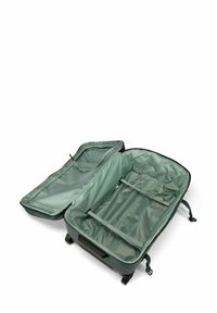 Valise à roulettes en nylon vert foncé, présentant un intérieur spacieux avec des poches en maille et des bandes réglables, partiellement ouverte pour révéler son contenu.