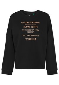 Felpa nera in cotone, con scollo tondo, maniche lunghe e testo di colore rame con marchio e dettagli del prodotto stampati sulla parte frontale.
