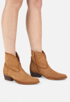 Bottines de cowboy / motard - cuero
