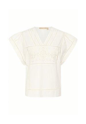 Blusa bianca di cotone con maniche corte, scollatura a V e dettagli ricamati sul petto. Presenta cuciture decorative lungo le cuciture.