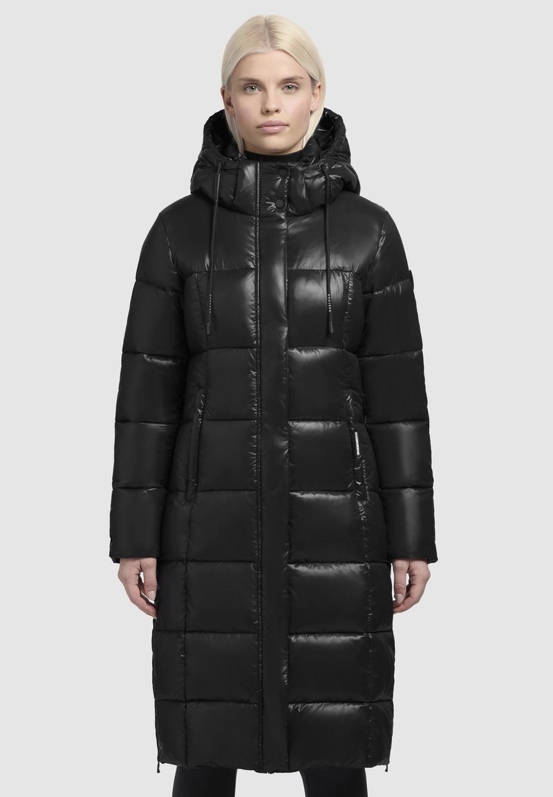 Black puffer coat with a hood, featuring a shiny texture, quilted design, front zip closure, and side pockets.