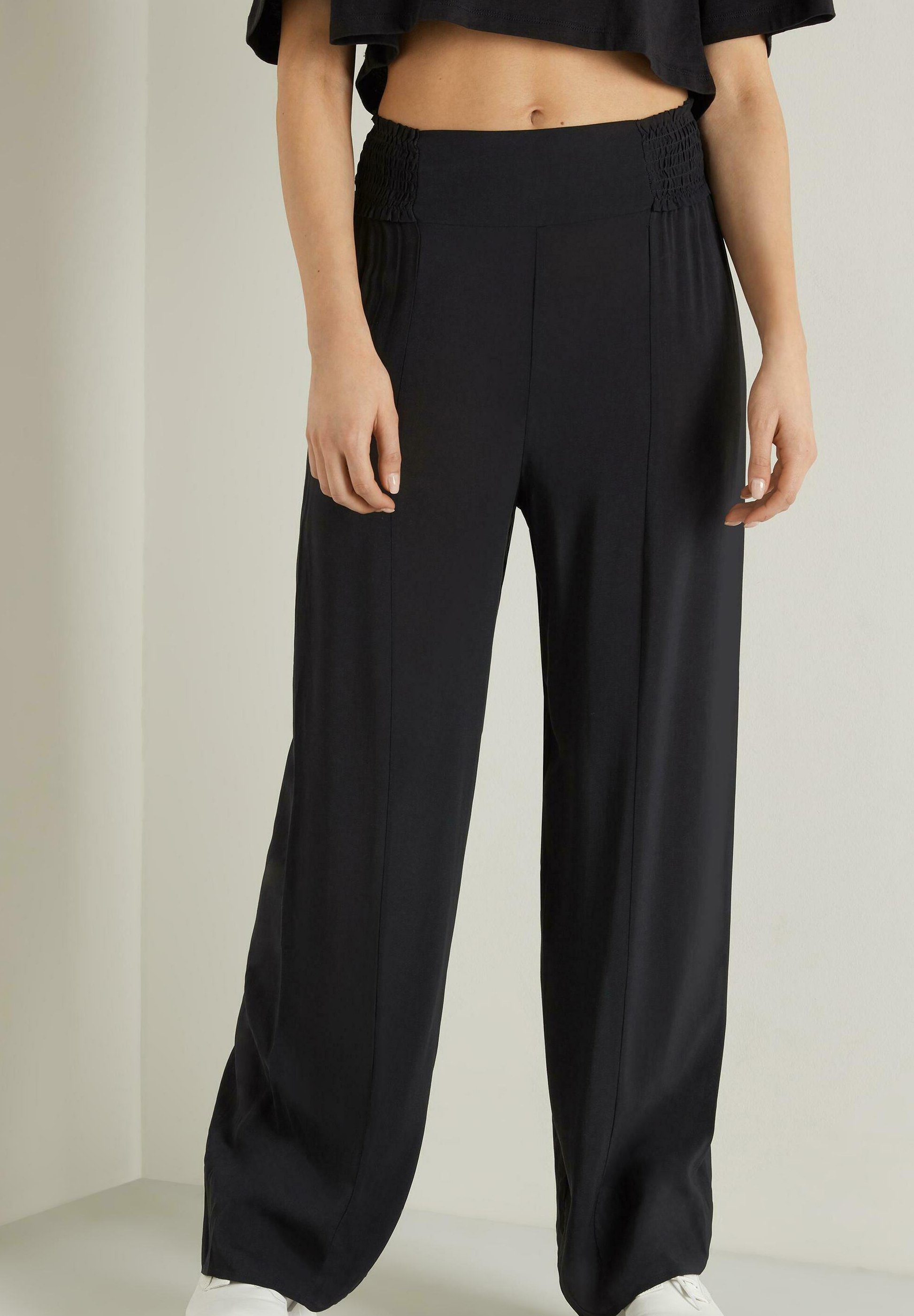 Tezenis PALAZZO MIT HOHEM, GESMOKTEM BUND - Pantalones - black/negro -  Zalando.es