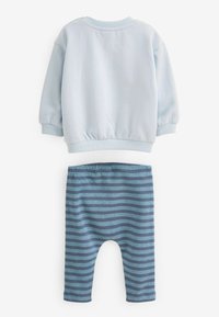 Next COSY PIECE SET STANDARD - Legíny - kalhoty  - pale blue dog