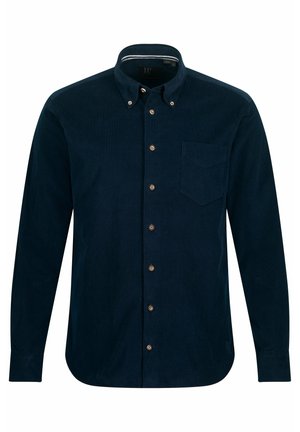 Laivastonsininen vakosamettipaita, jossa on pitkät hihat, napitettava kaulus, rintatasku ja pronssin väriset napit edessä; sileä pinta.