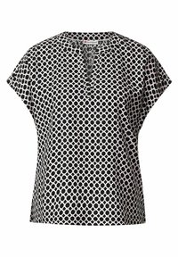 Krótka bluzka z krótkim rękawem, ozdobiona czarno-białym okrągłym wzorem, dekoltem w serek z guzikami i luźnym krojem w lekkim materiale.