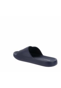 Ciabatta scivolosa blu navy realizzata in materiale flessibile, dotata di una larga fascia e di una soletta testurizzata per il comfort. Suola liscia per uso interno o esterno.