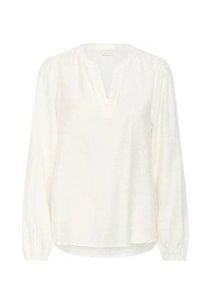 Balta garo piedurkņu blūze, kas izgatavota no viegla auduma. Tam ir V-veida kakla izgriezums ar pogas detaļu, sarcinātas piedurknes un brīvs piegriezums.