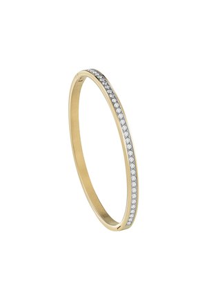 Bracelet jonc en or au design épuré, ornée d'une rangée de pierres claires scintillantes sur un côté et d'une surface lisse et polie.