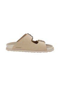 Beige suede slide sandals with an open toe, cut-out side, and adjustable buckle detail. Thick sole provides cushioning.