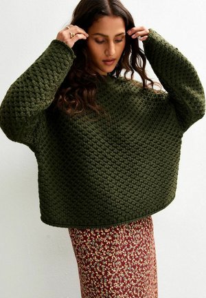- Sweter