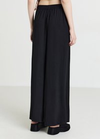 Calliope CON PANNELLI UNITA - Stoffhose - ultrablack