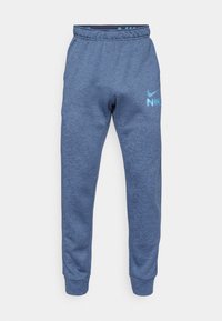 Blå Nike joggere lavet af blødt, struktureret stof. Har elastisk talje, smalle ben og et fremtrædende logo i lyseblå.