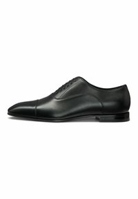Black leather dress shoe with a pointed toe and a smooth finish. Features six eyelets for laces and a sleek, minimal design.
