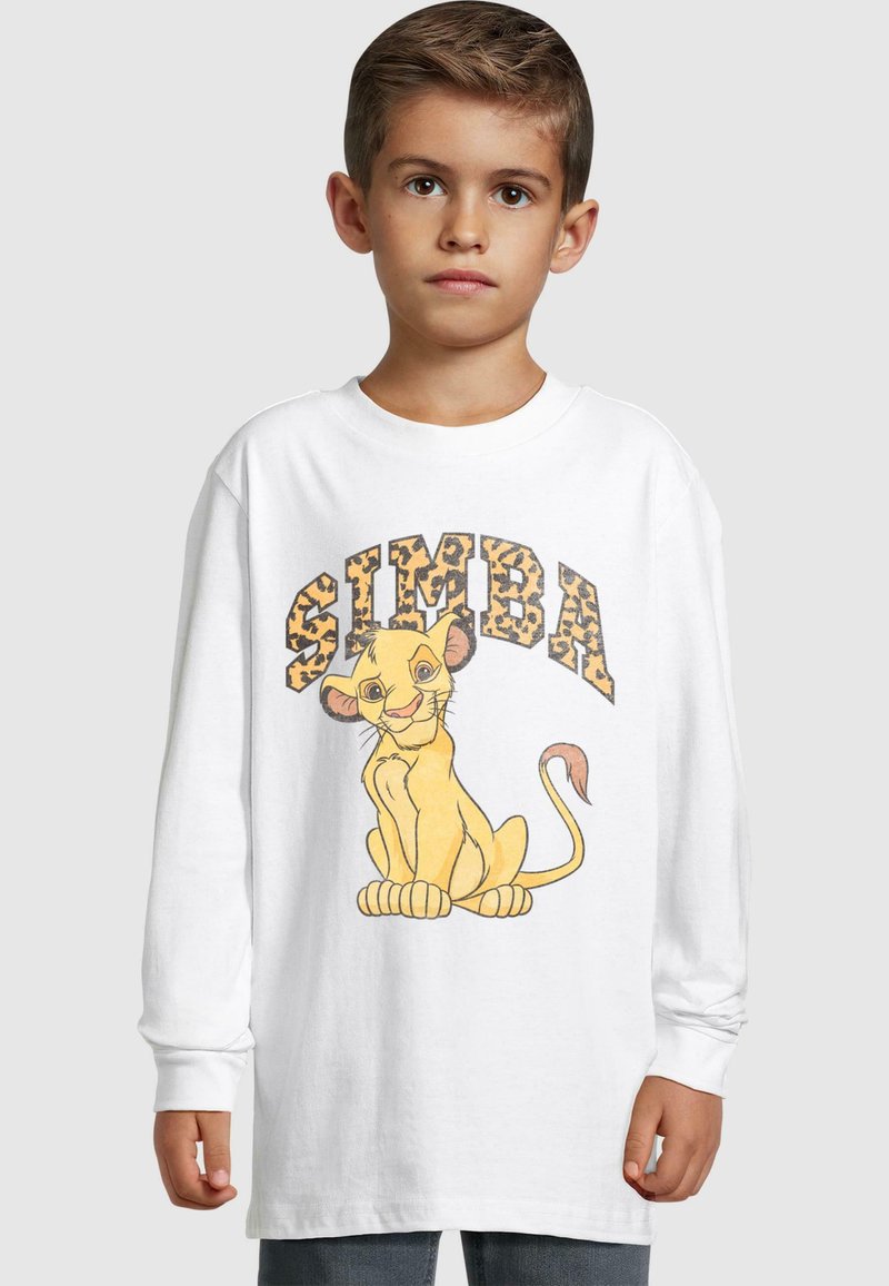 Long-sleeve white t-shirt featuring a colorful graphic of a seated lion cub and the word "SIMBA" in a leopard print style above it.