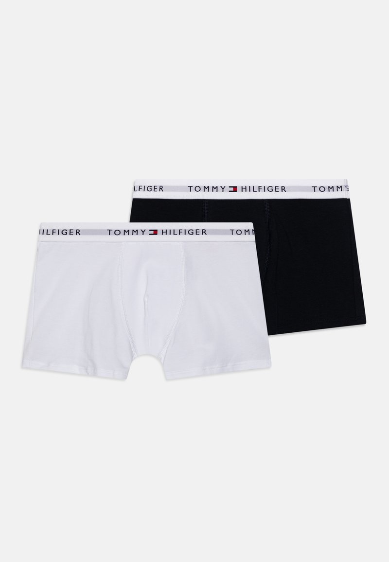 Vīriešu bokseršorti komplektā balta un melna krāsā, izgatavoti no kokvilnas. Iezīmēts ar elastīgu jostu ar "TOMMY HILFIGER" zīmolu. Klasiska piegriezuma, gluda tekstūra.