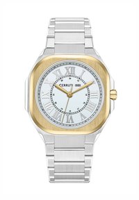Reloj de acero inoxidable plateado con un bisel cuadrado en tono dorado, dial blanco con números romanos y una aguja de segundos dorada, terminado con una pulsera de eslabones.