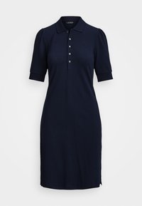 Marinblå polo klänning med korta puffärmar, treknäppt placket och subtil logotypdetalj. Slät stickad tyg, knälång.