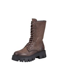 Brown leather lace-up boot featuring a chunky black rubber sole and textured surface. Mid-calf height with reinforced stitching and logo detail.