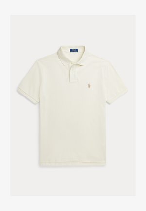 Bavlnená polo košeľa v off-white farbe, s plochým golierom, krátkymi rukávmi a vyšitým logom v hnedej farbe na ľavej hrudi.
