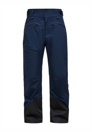 Marineblaue wasserdichte Hose mit schwarzem unteren Saum, Reißverschlusstaschen und verstellbarem Bund. Hergestellt aus strapazierfähigem, leichtem Stoff.