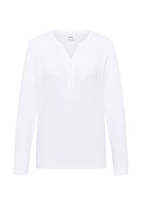 Hvid langærmet skjorte med V-udskæring og fem knapper. Fremstillet af blødt stof med en glat tekstur og uden mønstre.