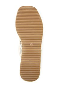 Rubberen sandaalzool in bruin met verticale groeven voor grip, met een maatstreep "40" nabij het midden, gladde randen en een gestructureerd oppervlak.