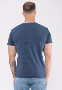 Paradiso Clothing GUNS N' ROSES CLASSIC BAND LOGO SNOW WASH - Print T-shirt - blue