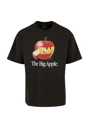 T-shirt en coton noir présentant un grand graphique d'une pomme souriante avec une peau rouge, un visage jaune et le texte "La Grande Pomme".