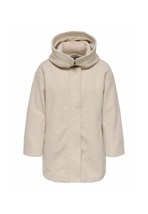 Kaput s kremastom vunom s teksturiranim završetkom, visokim ovratnikom i prednjim zatvaračem. Ima široke rukave i ravnu siluetu.