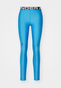 Jasnoniebieskie legginsy wykonane z gładkiego, elastycznego materiału. Posiadają czarną talię z białym logo "UNDER ARMOUR" oraz smukły krój.