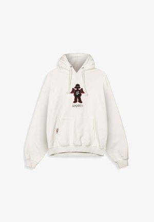 Weißer oversized Hoodie mit einem schwarzen und roten Grafikdesign eines stilisierten Körpers auf der Brust. Enthält eine Fronttasche und eine Kapuze mit Kordelzug.