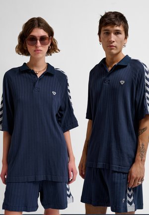 Hummel LOOSE UNISEX - Poloshirts - black iris
