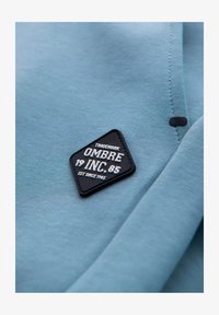 Niewybrane, pale blue