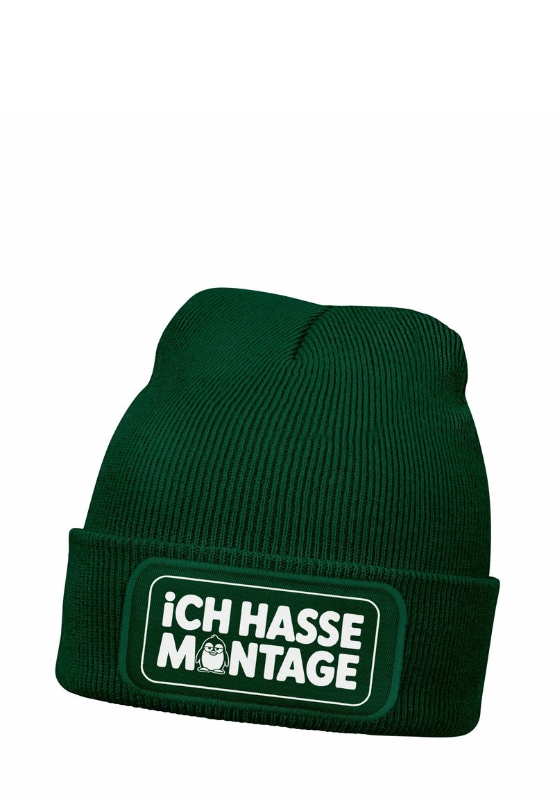 Dark green knit beanie with a folded brim featuring white text "ICH HASSE MONTAGE" and a small cartoon penguin in the design.